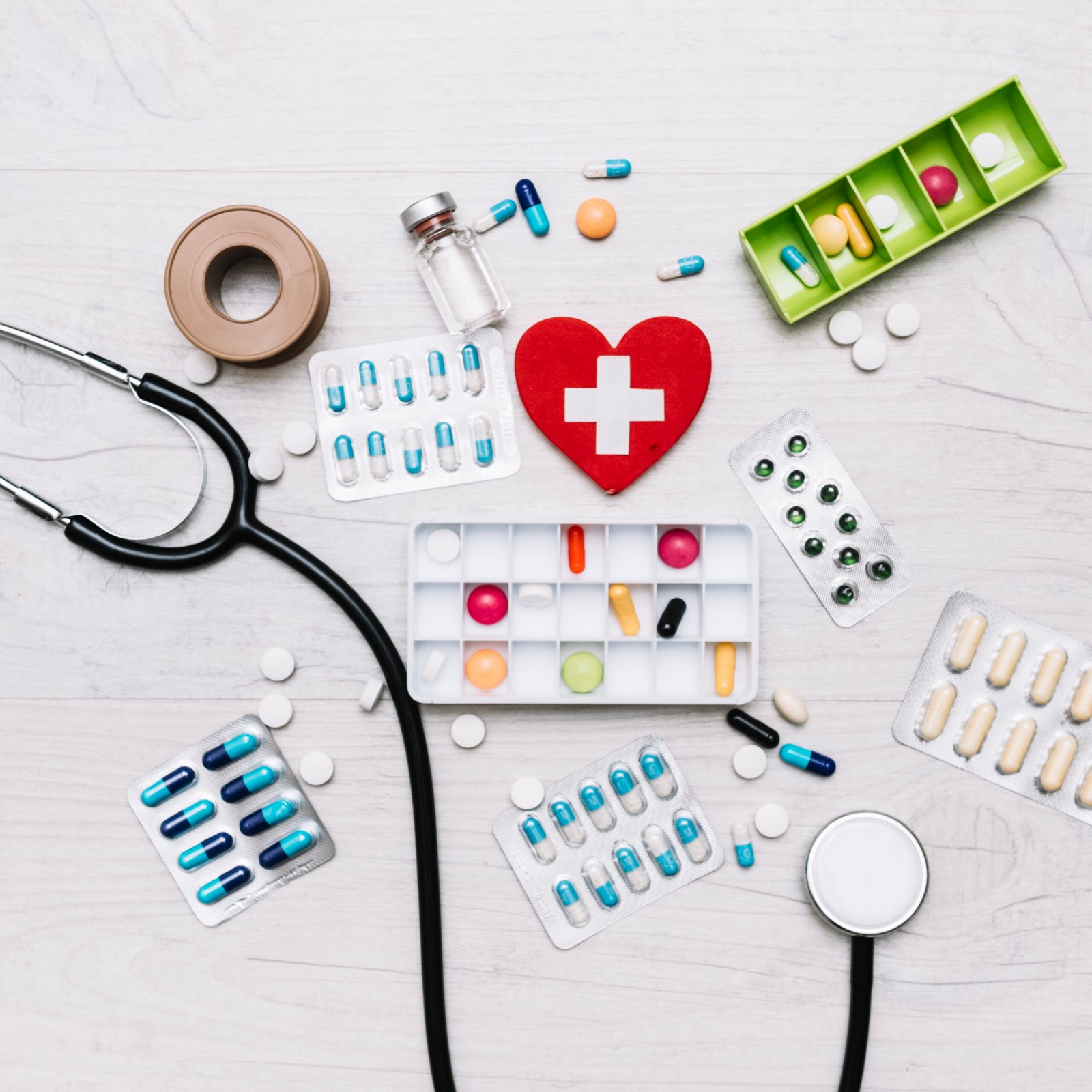 heart-with-cross-near-stethoscope-medications